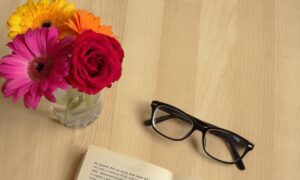 flowers and glasses on table